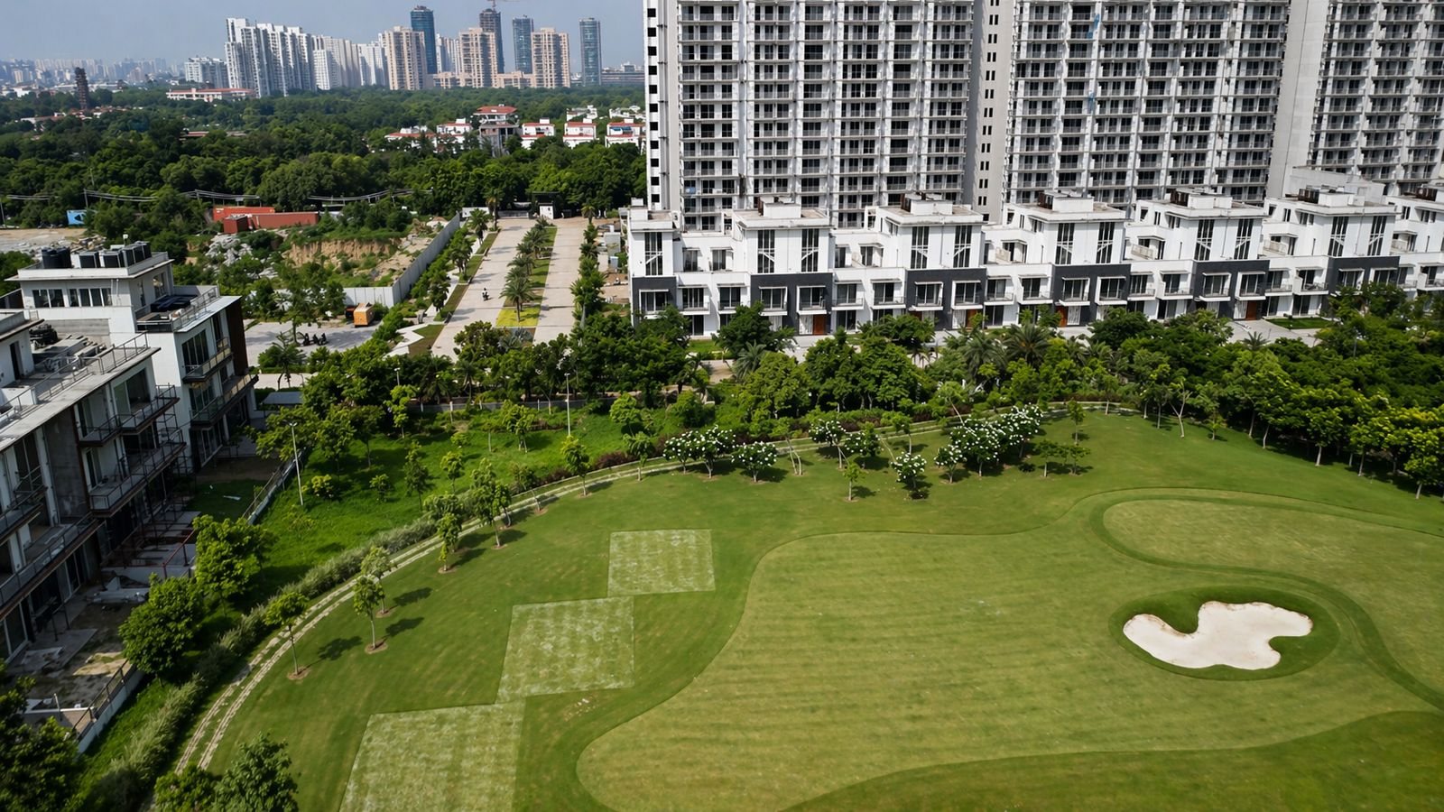 Residences overlooking landscaped golf course at Godrej Golf Links